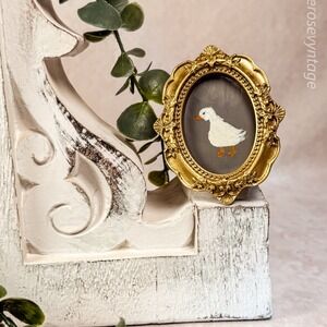 Oval Framed Goose Painting